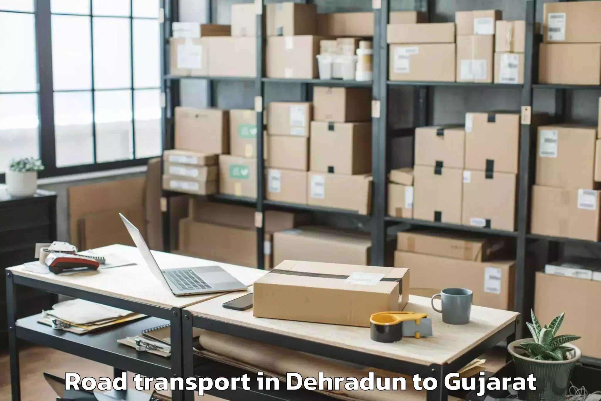 Top Dehradun to Kadodara Road Transport Available